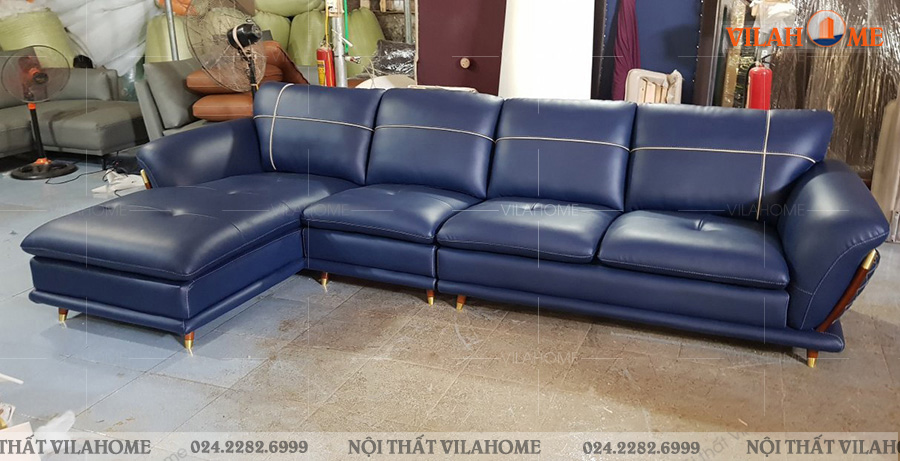 Mẫu sofa góc phòng khách da màu xanh