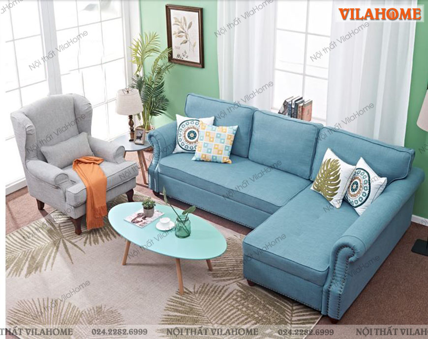 Ghế sofa bọc vải màu xanh cách điệu ấn tượng
