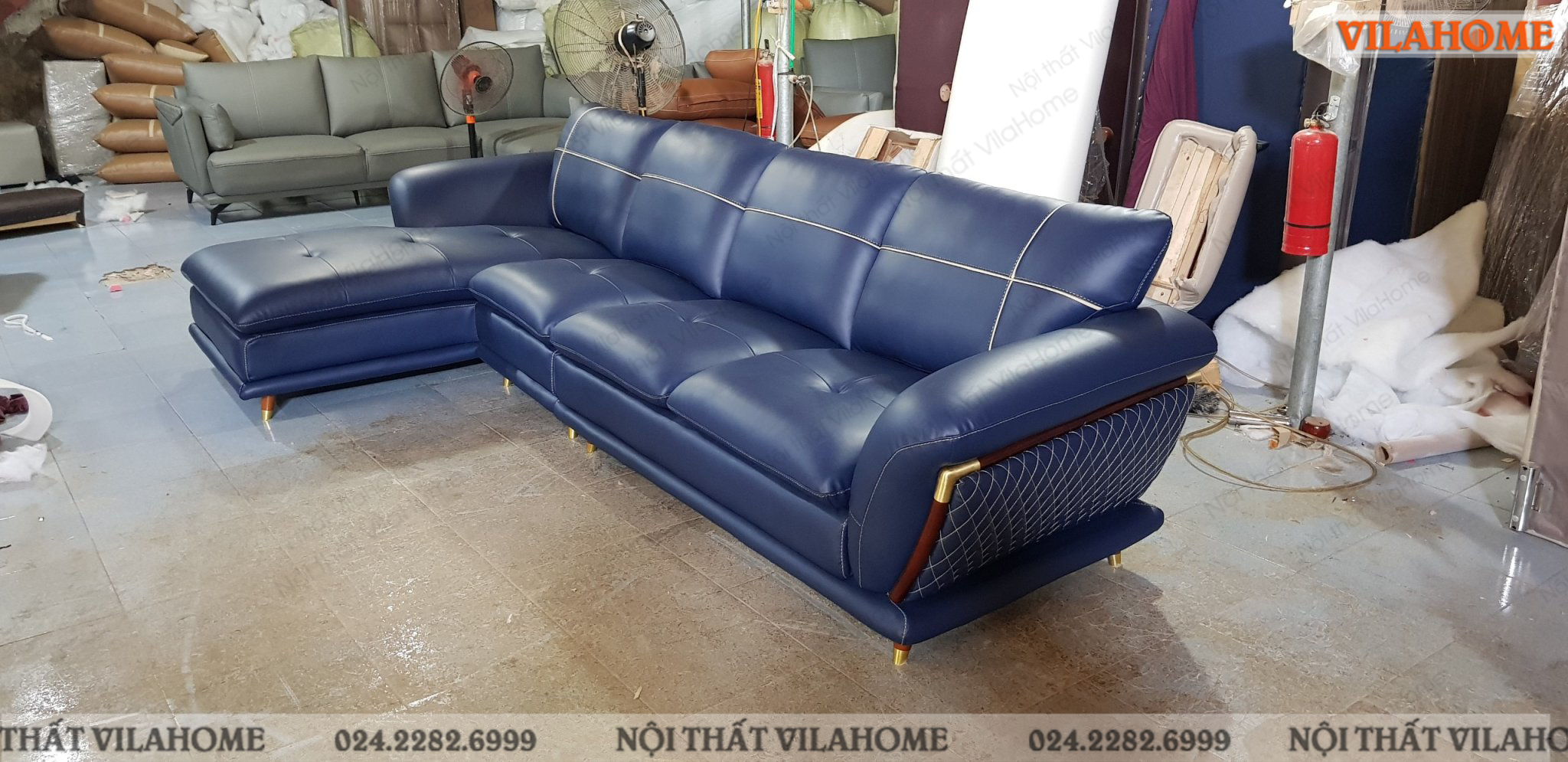 Sofa xanh da phòng khách VilaHome